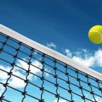 Serving for Columbus House Benefit Tennis Tournament