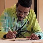 Isaac working on an art piece