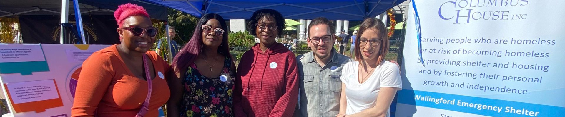 Group of people posing together outside at a Columbus House event